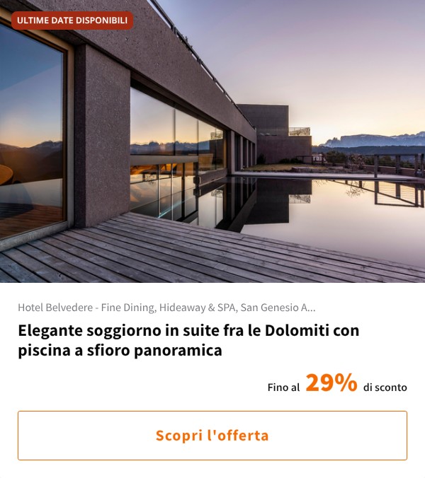 Elegante soggiorno in suite fra le Dolomiti con piscina a sfioro panoramica