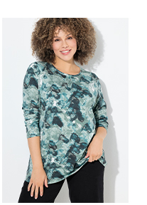 Maglia dal taglio svasato con fiori, pieghe decorative, scollo a girocollo e maniche lunghe