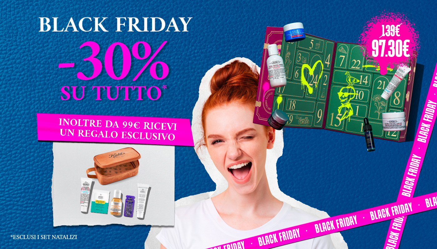 Immagine promozionale Kiehl’s per il Black Friday: tastiera blu con tasti rosa e viola che mostrano le scritte “Black Friday”, “25% su tutto”, “30% da 99€” e “mini taglie in regalo”. In primo piano i prodotti Kiehl’s Ultra Facial Cream, Creamy Eye Treatment con Avocado e Clearly Corrective Dark Spot Solution. A destra un set di mini taglie e un beauty case marrone. Questa immagine porta alla sezione promozionale del Black Friday Kiehl’s.