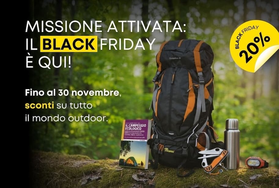 an image of a backpack and a water bottle sitting on a moss covered ground