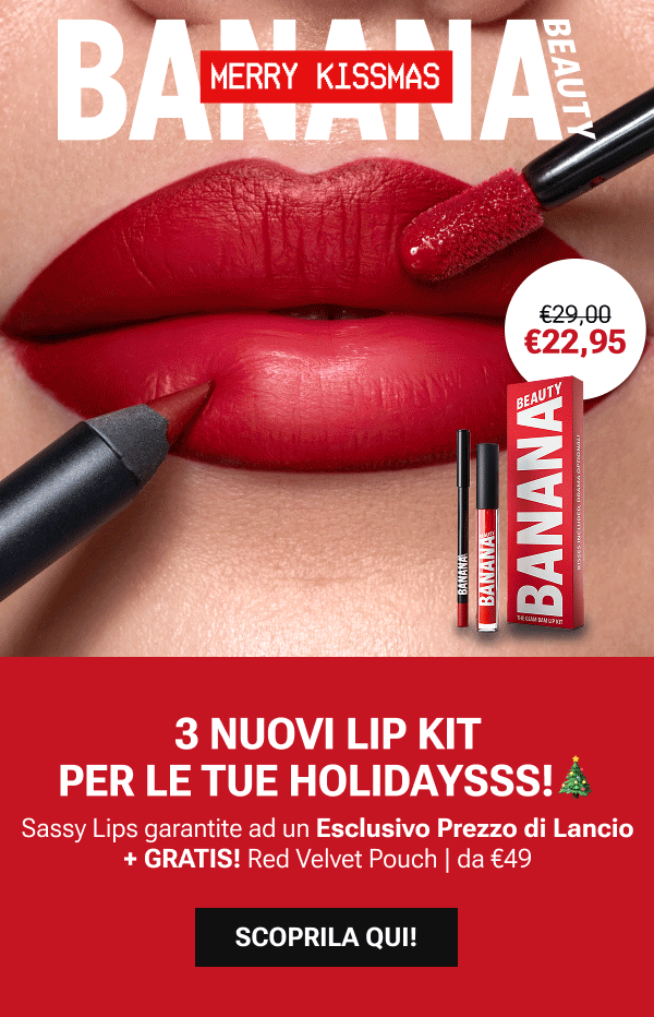 Banner beauty con la scritta «Merry Kissmas»: primo piano di labbra rosse sassy truccate con matita labbra e gloss, accanto a un Lip Kit BANANA Beauty, prezzo lancio 22,95 € invece di 29 €, e indicazione di 3 nuovi Lip Kit per un holiday glow, più Velvet Pouch rossa in regalo da 49 € di ordine.