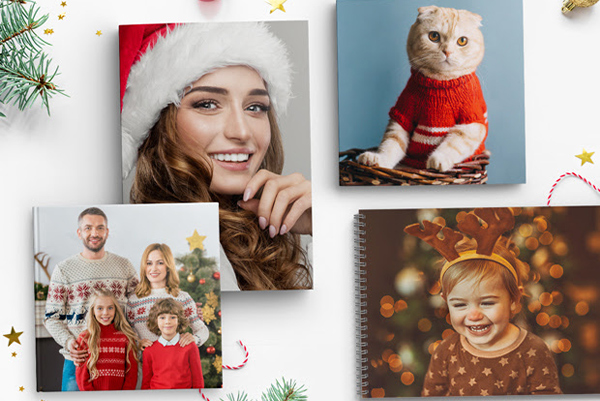 Un Fotolibro aperto, mostrando pagine piene di foto memorabili.