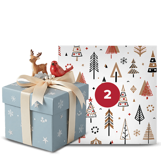 Una confezione regalo festiva decorata con una renna e un cardinale, posizionata accanto a un quadrato decorativo con un motivo ad albero ripetuto e un numero 2.