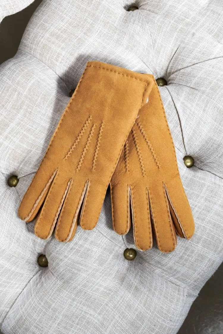 Image of Guanti in montone merinos color cuoio da donna con risvolto