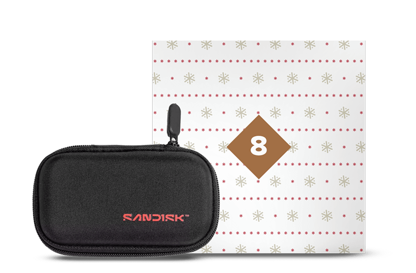 Una custodia SanDisk nera con cerniera, accanto a un calendario dell'avvento quadrato bianco con fiocchi di neve e il numero 8.