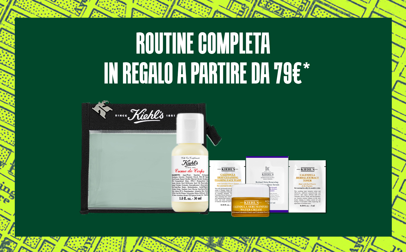 Banner Kiehl&rsquo;s con titolo 'Routine completa in regalo a partire da 79&euro;'. Mostra sei prodotti in mini-size in ordine di routine: detergente, tonico, siero trattante, crema idratante, lozione corpo e una pochette da viaggio.