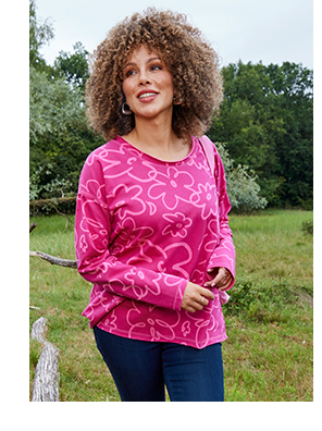 Felpa con fiori, orli arrotolati, scollo a girocollo e maniche lunghe