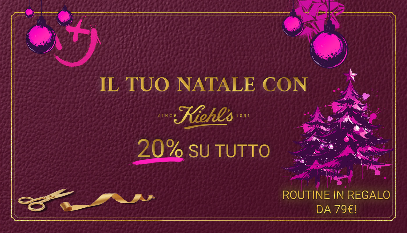 Sfondo rosso scuro con decorazioni natalizie rosa e oro. Testo centrale &ldquo;Il tuo Natale con Kiehl&rsquo;s &ndash; 20% su tutto&rdquo;. In basso a destra la frase &ldquo;Routine in regalo da 79&euro;&rdquo;