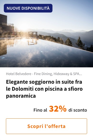 Elegante soggiorno in suite fra le Dolomiti con piscina a sfioro panoramica