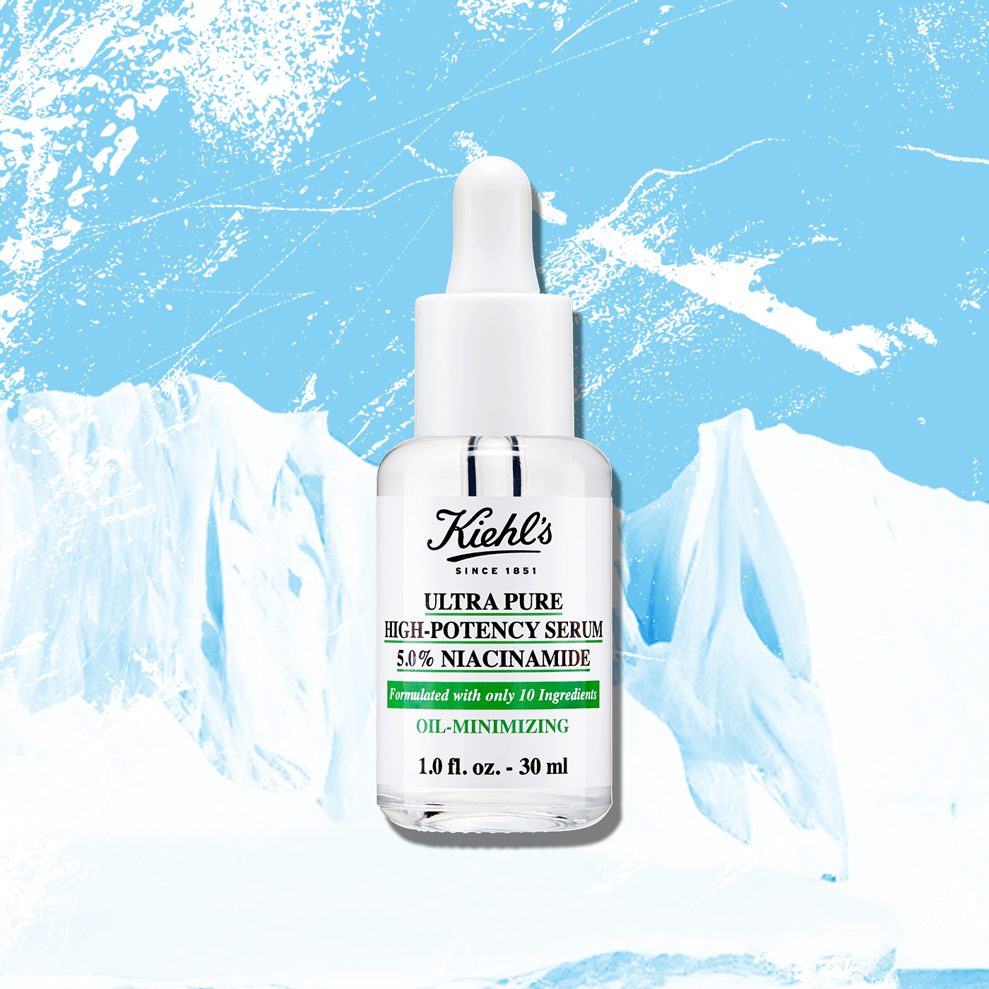 Flacone di Ultra Pure High-Potency Serum 5% Niacinamide Kiehl&rsquo;s su sfondo ghiacciato. Siero viso ad alta concentrazione che aiuta a ridurre lucidit&agrave; ed eccesso di sebo.