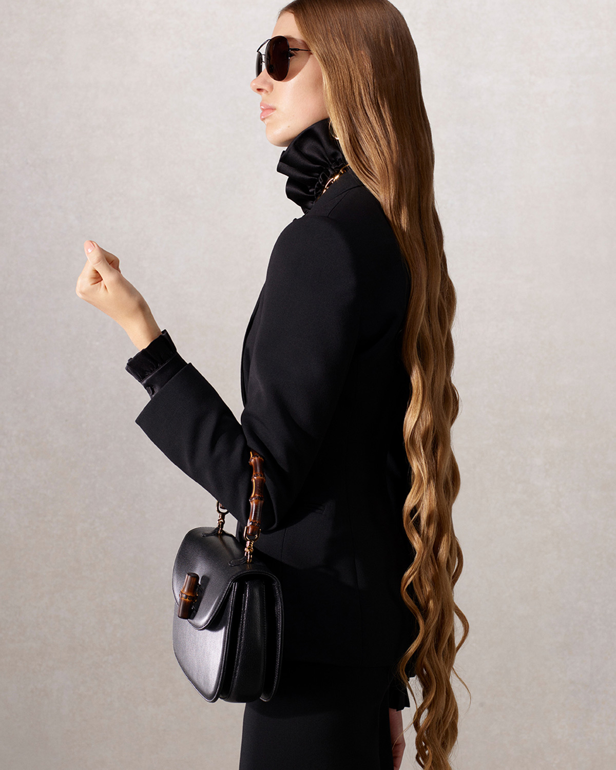 Capo di abbigliamento Scopri di più sul sito Web di Gucci 