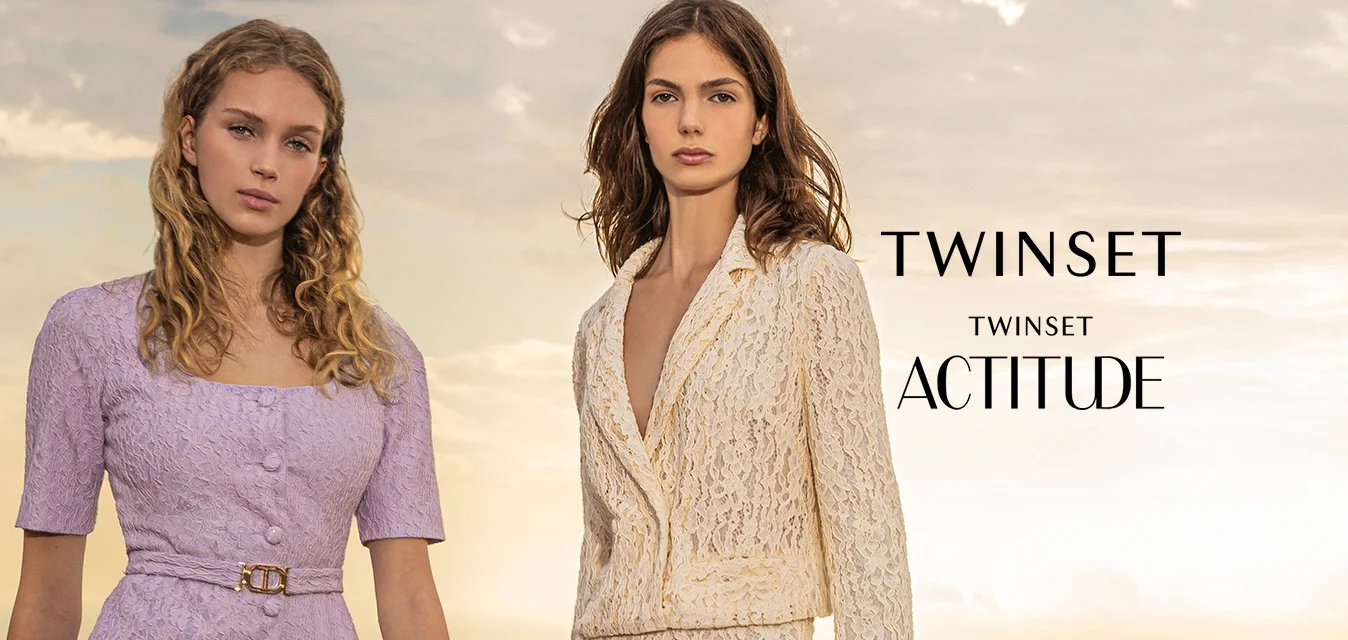 Tre modelli indossano completi in pizzo: un top attillato lavanda con peplum, un blazer e pantaloni in avorio, e un completo testurizzato verde chiaro.