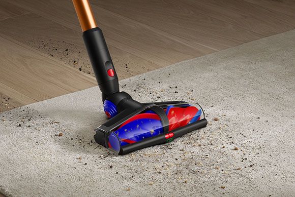 The Dyson All Floor Cones Sense cleaner head adapts suction between floor types.