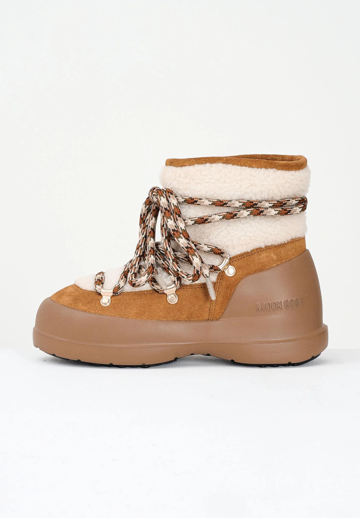 Image of MOON BOOT Stivali da neve LUNA in shearling marrone da donna