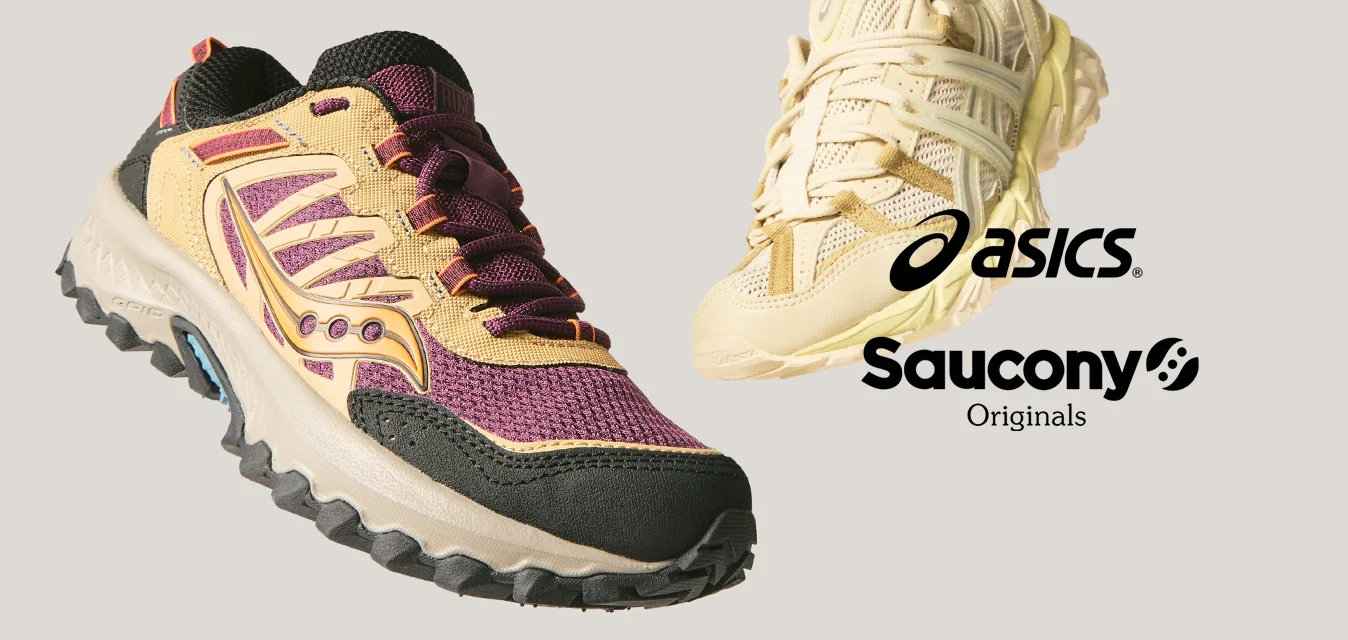 Coppia di scarpe da ginnastica, una beige e viola con accenti neri, una beige chiaro, entrambe con suole robuste, mostrate su uno sfondo chiaro e semplice.