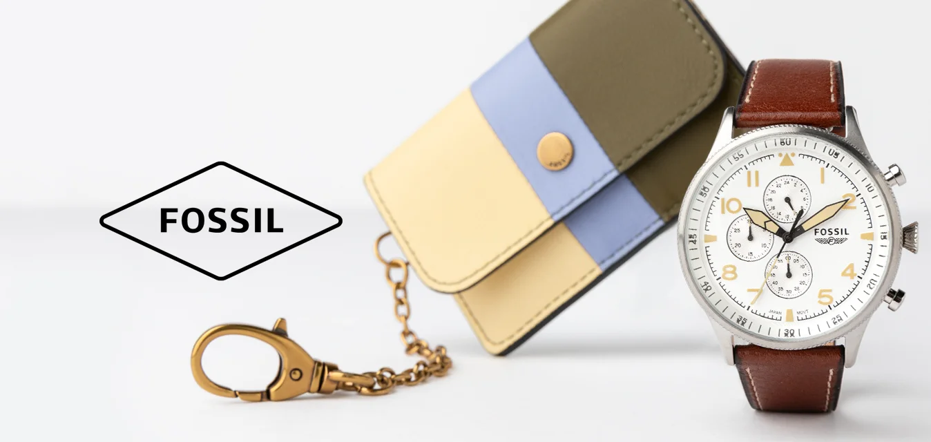 Orologio cronografo argento con quadrante bianco e cinturino in pelle marrone. Accompagnato da un portafoglio in pelle tricolore nei colori oliva, blu e giallo.