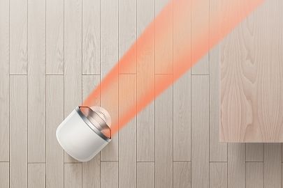 Il ventilatore e termoventilatore Dyson Hot+Cool HF1 Remote Link Pre-heat che diffonde un flusso d’aria calda in una stanza.