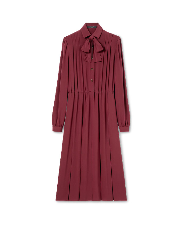 Capo di abbigliamento Scopri di più sul sito Web di Gucci 