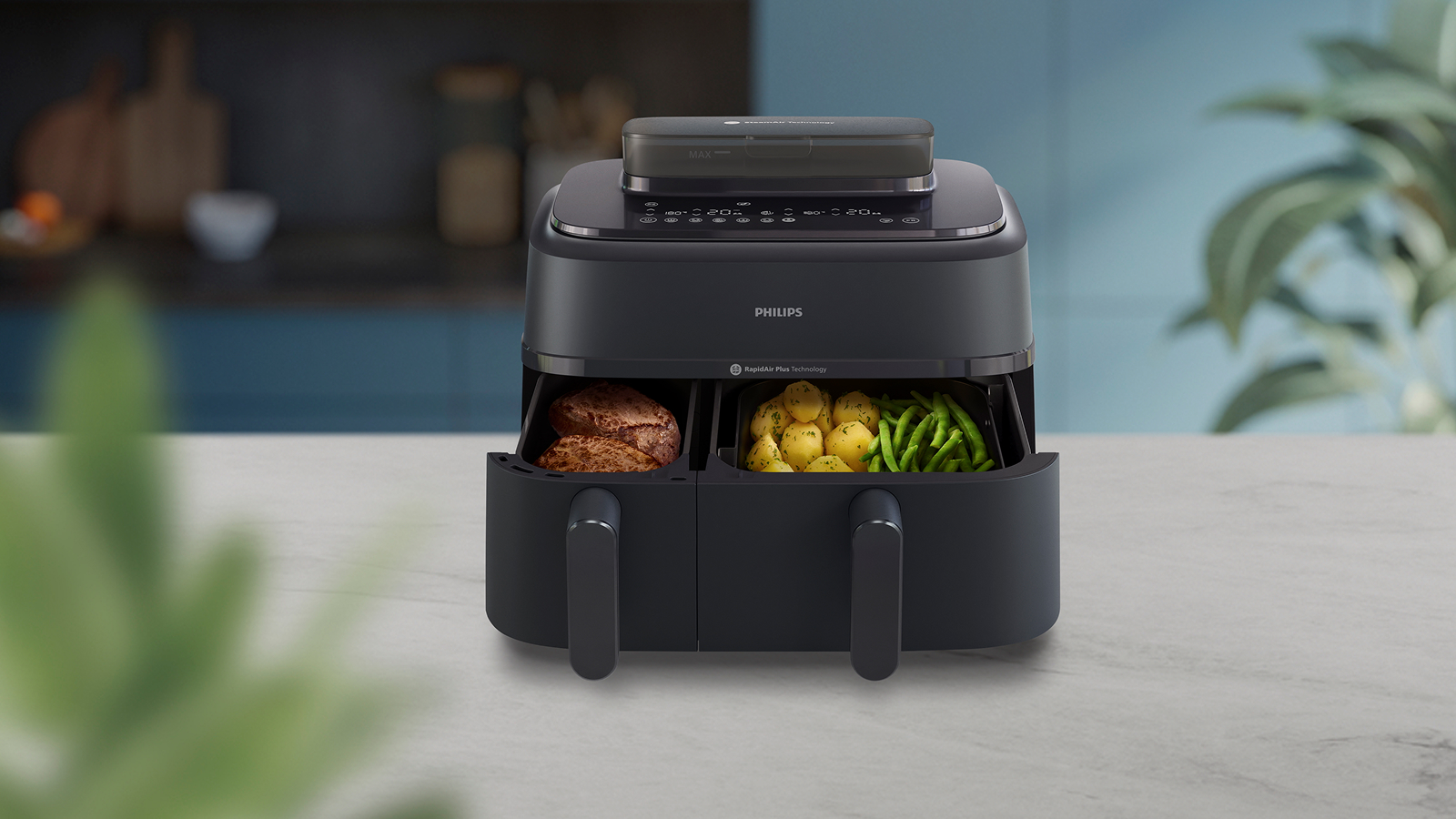 Scopri Philips Airfryer Serie 5000 con doppio cestello e vapore.