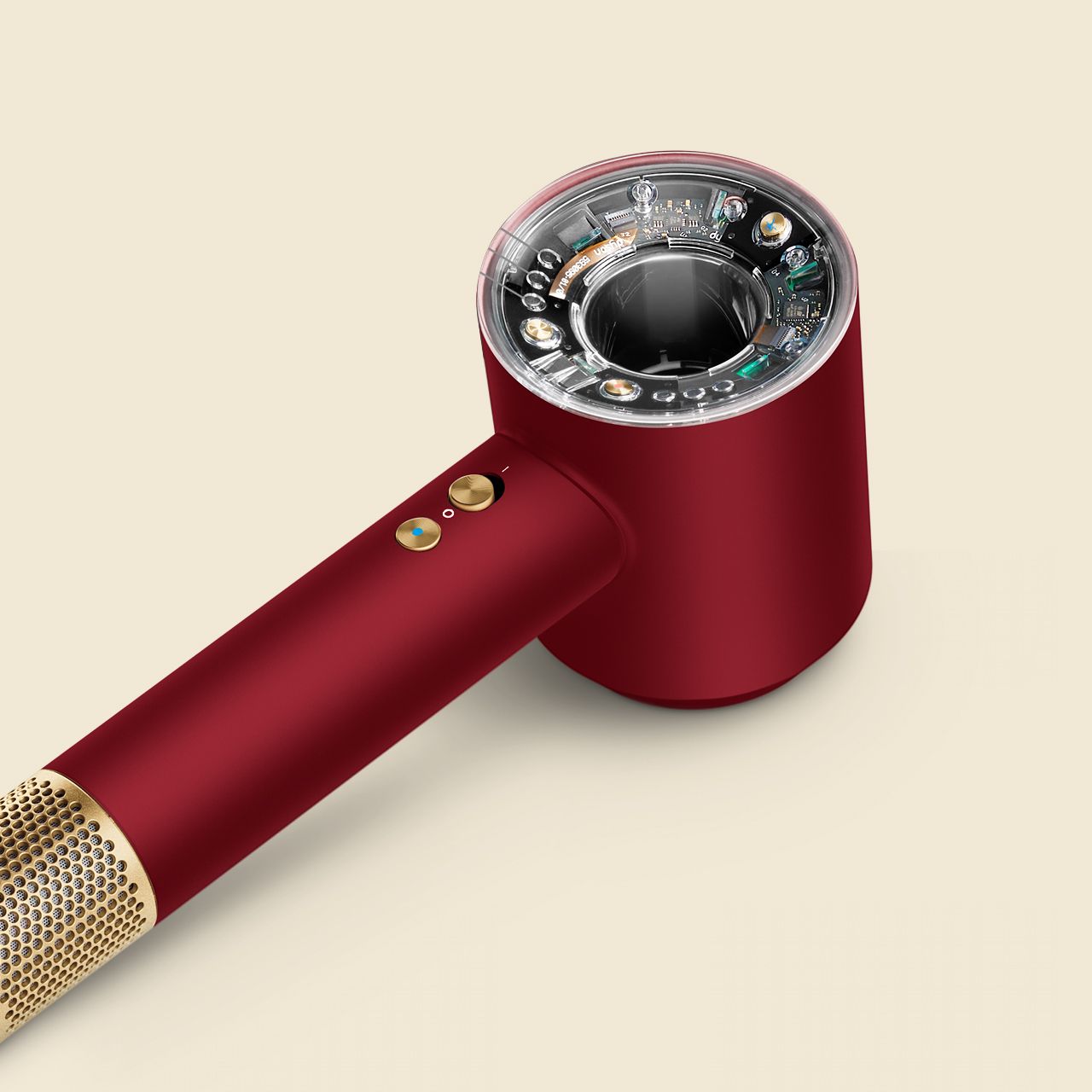 The Dyson Supersonic Nural hair dryer in Red velvet and gold.