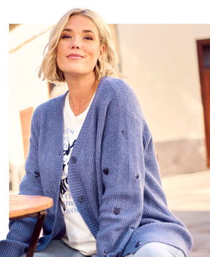 Cardigan con cuori di paillettes, scollo a V e maniche lunghe