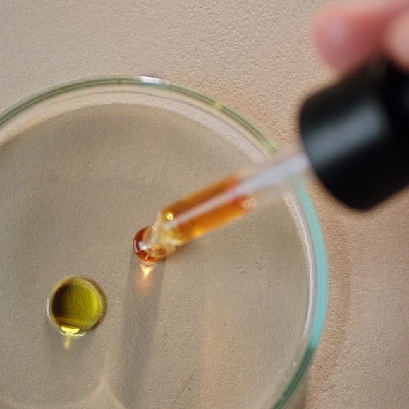 Dyson Amino11 blend is pipetted onto a petri dish.