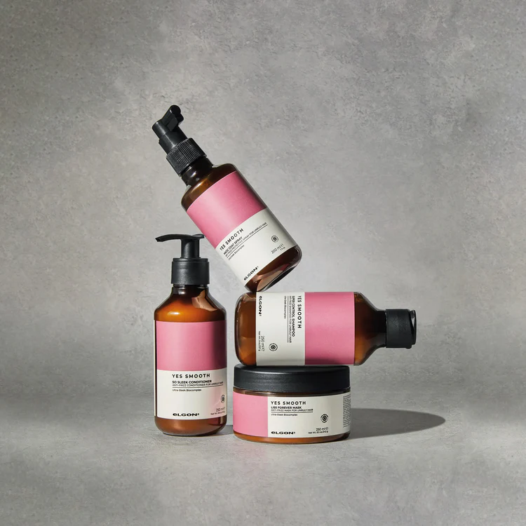 an image of a bottle of liquid and a bottle of lotion on a table