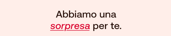 Testo su sfondo giallo: Abbiamo una sorpresa per te.