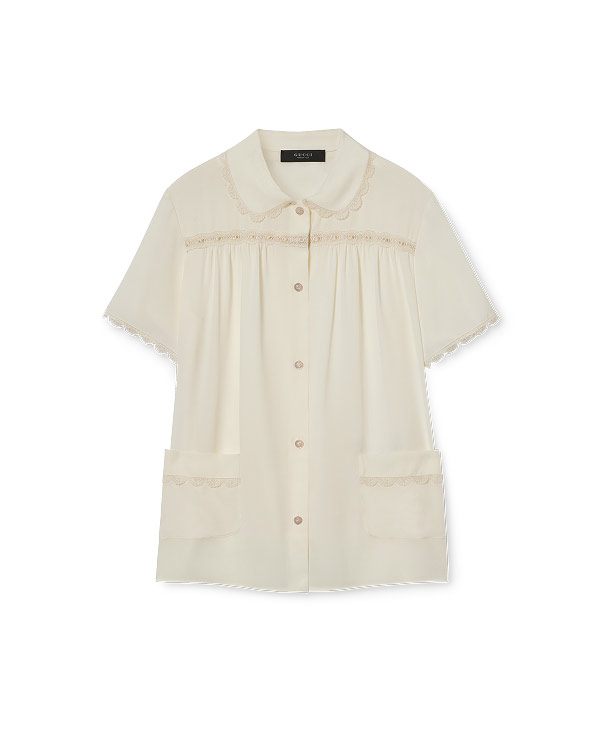 Capo di abbigliamento Scopri di più sul sito Web di Gucci 