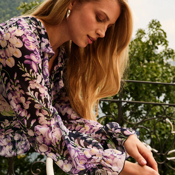 BLUSA STAMPATA CON VOLANT