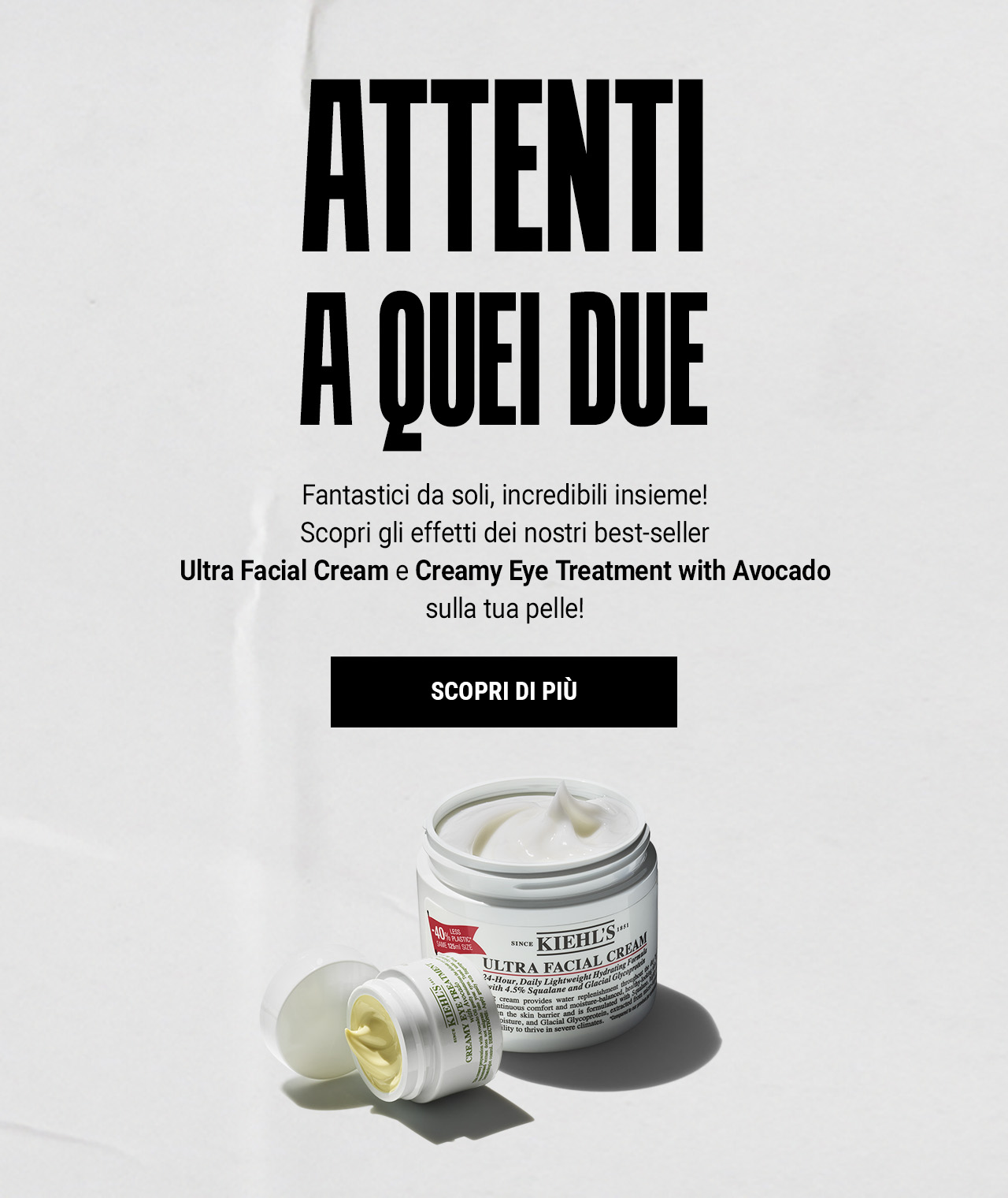 Banner promozionale con la scritta &ldquo;ATTENTI A QUEI DUE&rdquo; su sfondo chiaro. In primo piano un vasetto di Ultra Facial Cream aperto e un vasetto di Creamy Eye Treatment with Avocado con crema visibile all&rsquo;interno.