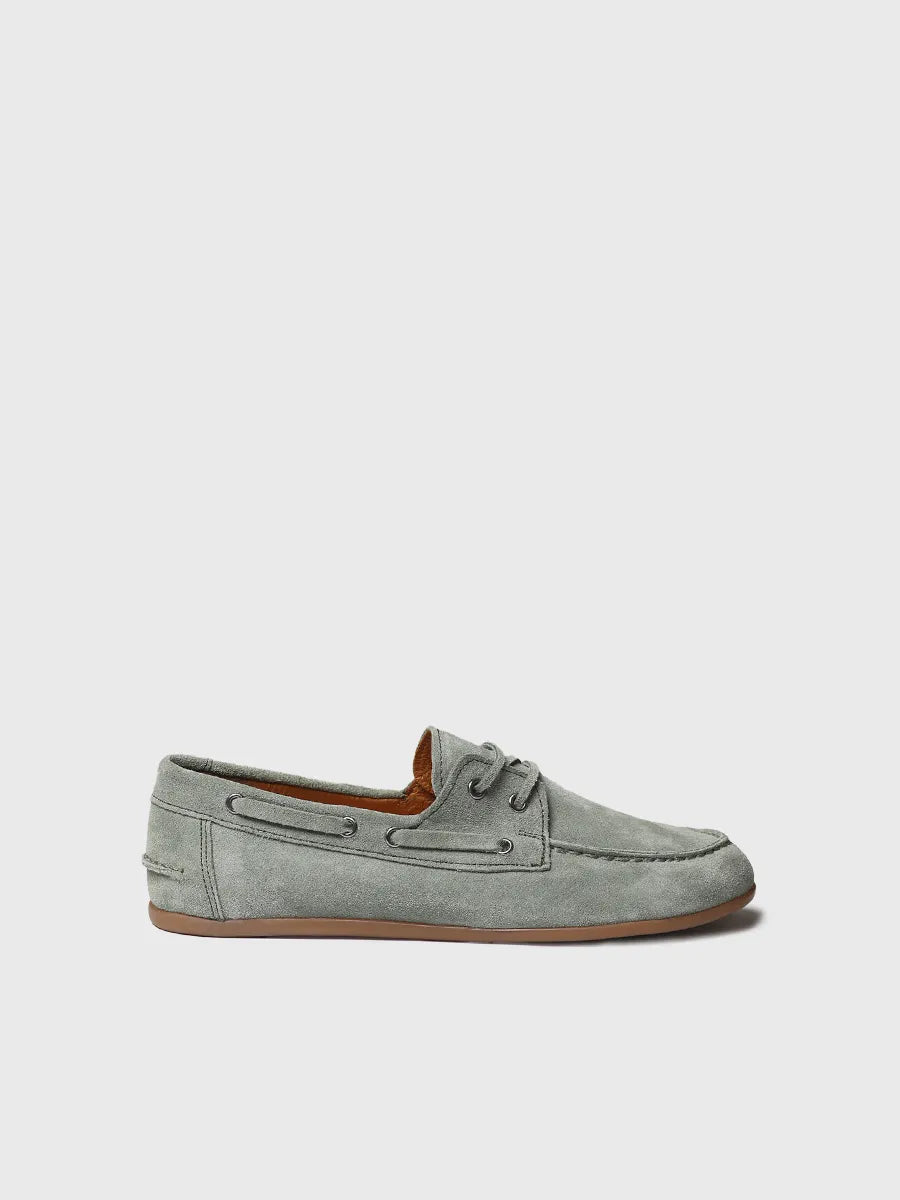 an image of a pair of grey shoes with a brown sole