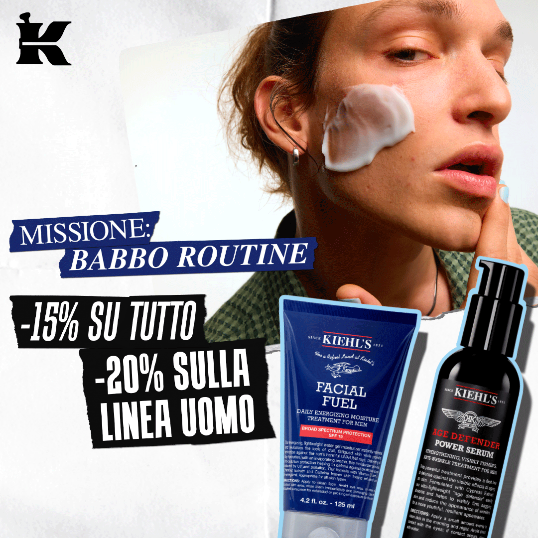 Visual campagna Kiehl&rsquo;s &ldquo;Missione: Babbo Routine&rdquo; con modello uomo che applica crema sul viso. Testo in sovrimpressione: -15% su tutto, -20% sulla linea uomo. In evidenza Facial Fuel e Age Defender.