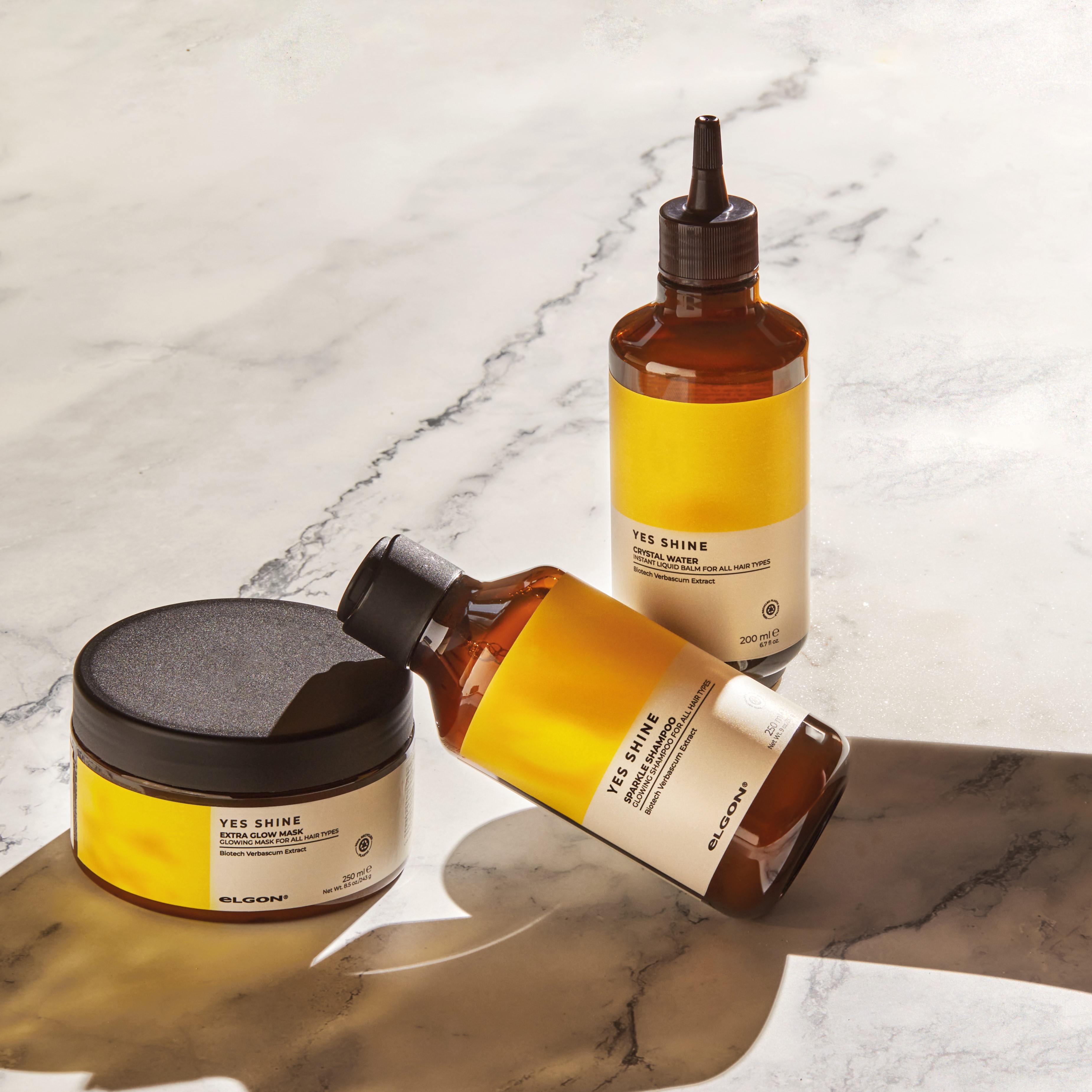 an image of a bottle of liquid and a bottle of liquid on a table