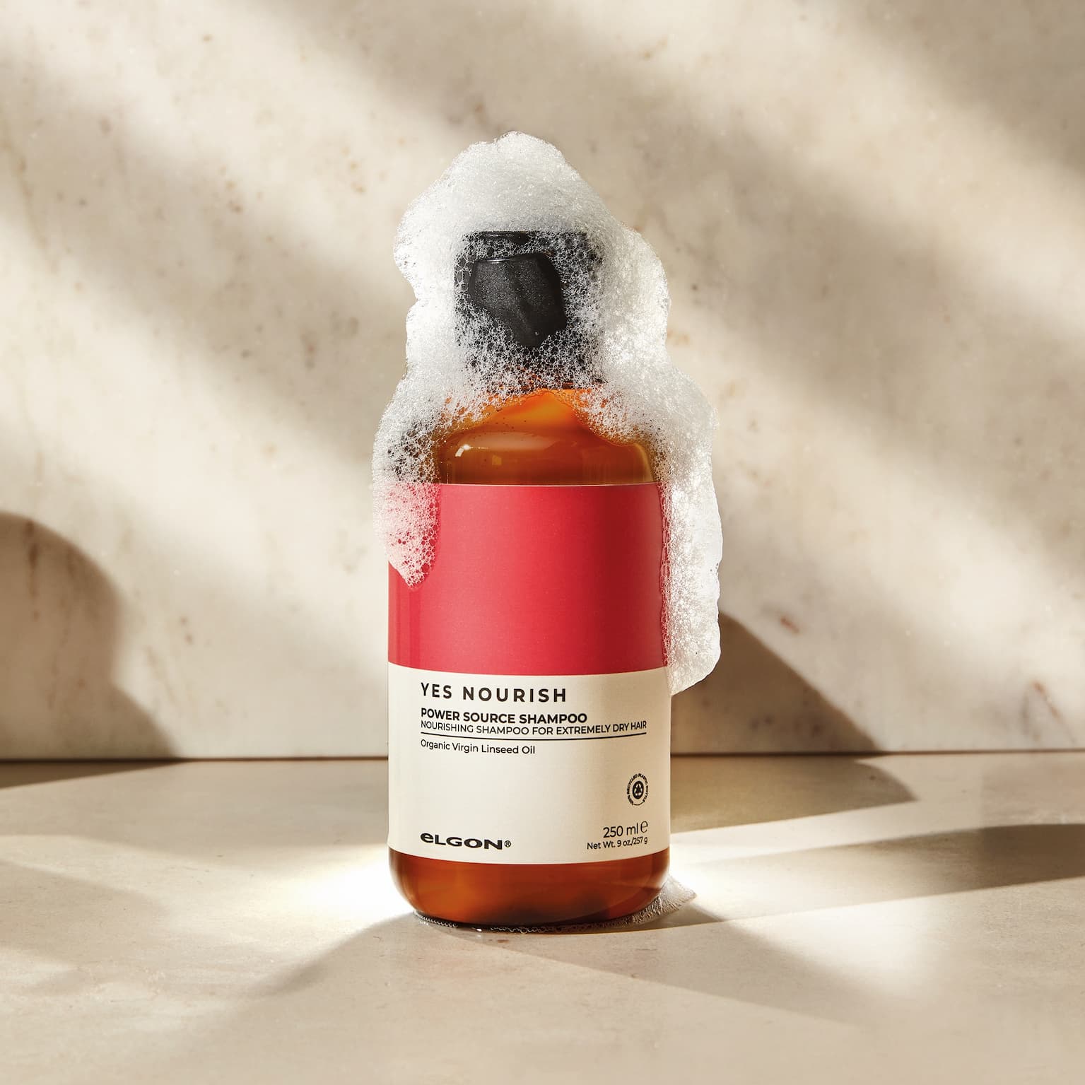 an image of a bottle of liquid and a bottle of liquid on a table