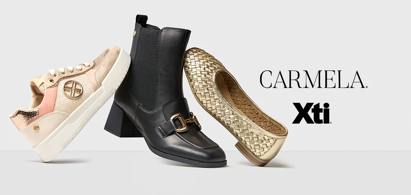 Tre paia di scarpe femminili equilibrati su una superficie chiara: sneaker beige, stivale con tacco nero e ballerina intrecciata dorata.