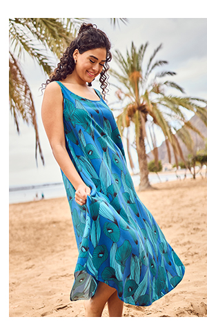 Abito midi dal taglio svasato e smanicato con calle e scollo a girocollo