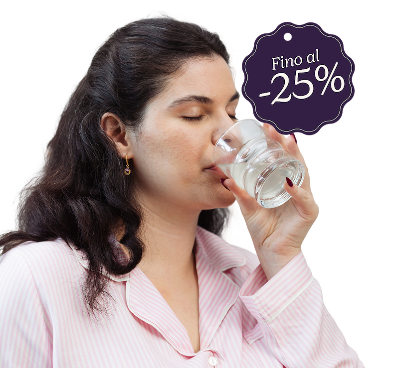 an image of a woman drinking a glass of water