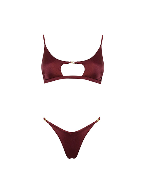 Burgundy two-piece bikini with underbust cut-out top and high-cut thong bottoms featuring gold hardware accents