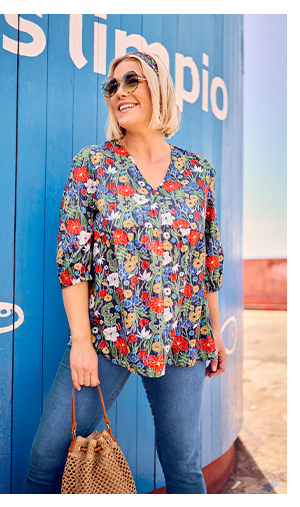 Blusa dal taglio svasato con glitter, fiori, scollo a V e maniche a 3/4