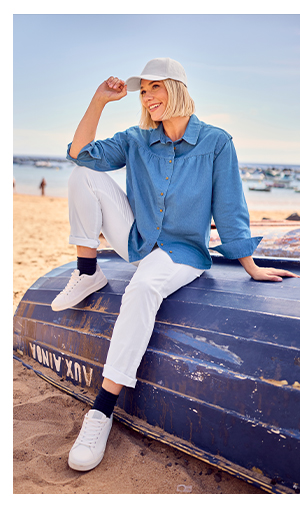 Blusa di jeans con accentuazione sulle spalle, collo da camicia e maniche lunghe