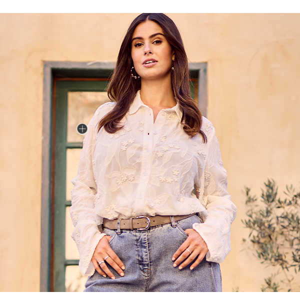 Blusa dal taglio svasato con ricami floreali, collo da camicia e maniche lunghe