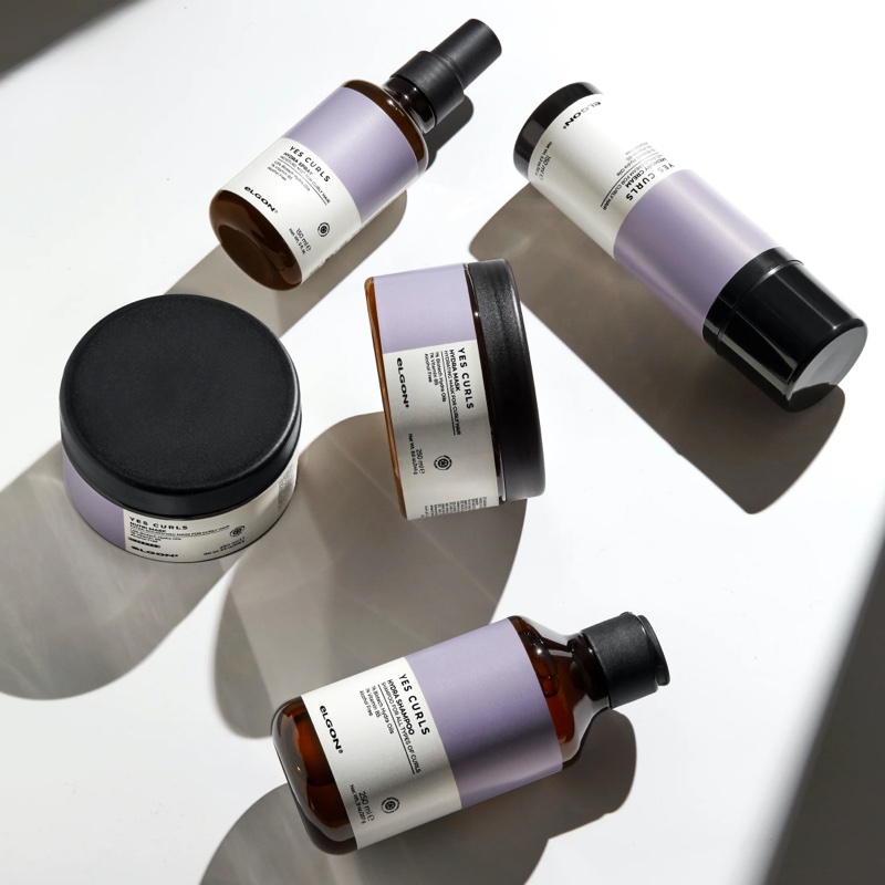 an image of a bottle of liquid and a bottle of liquid on a table