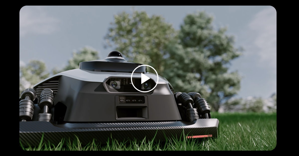 an image of a lawn mower sitting on top of a lush green field