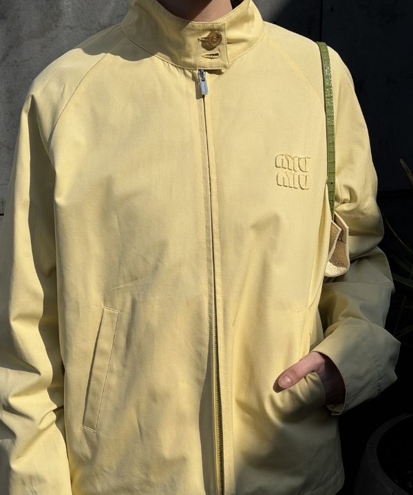 an image of a man taking a selfie in a clothing store