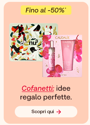 Due cofanetti regalo beauty: set nu3 con grafica illustrata e set Caudalie con prodotti viso su sfondo pesca. In alto un bollino giallo indica: &ldquo;Fino al -50%&rdquo;. Testo: &ldquo;Cofanetti: idee regalo perfette&rdquo;, con &ldquo;Cofanetti&rdquo; evidenziato in rosso corsivo e sottolineato. Pulsante: &ldquo;Scopri qui&rdquo;.