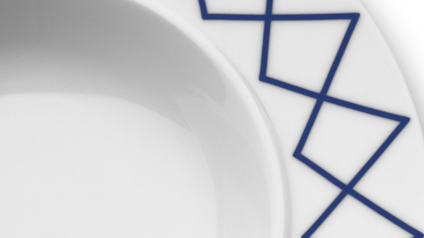 an image of a white plate with blue lines on it