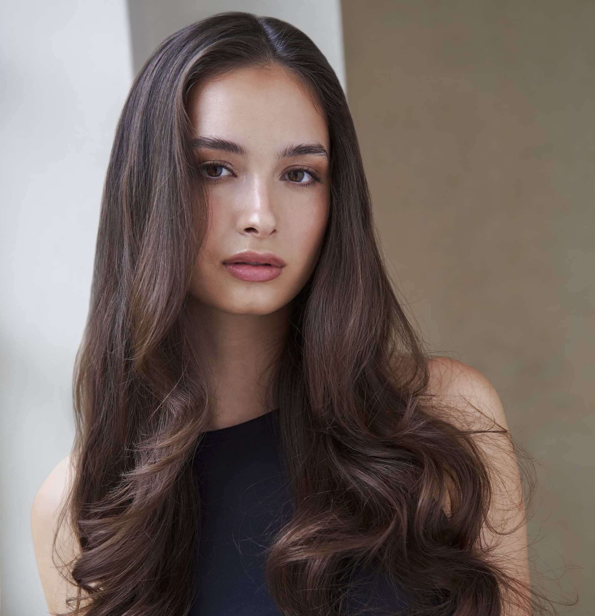 an image of a bottle of liquid and a bottle of liquid on a table