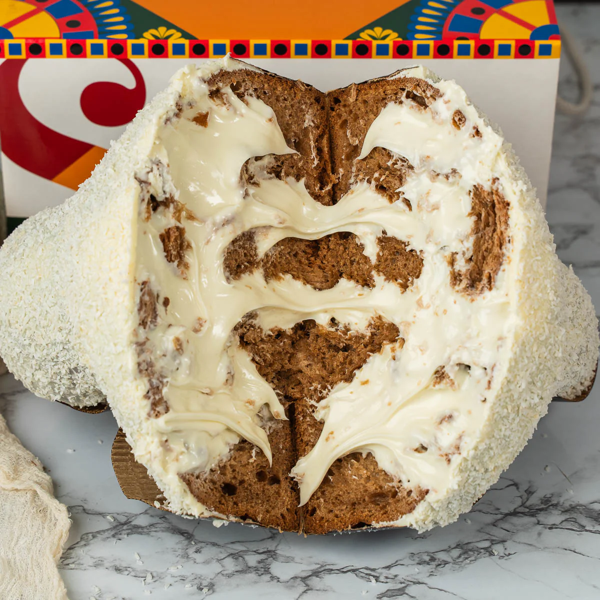 Image of Colomba artigianale COCCOLONA 1,3kg extrafarcita con 500g di crema cocco