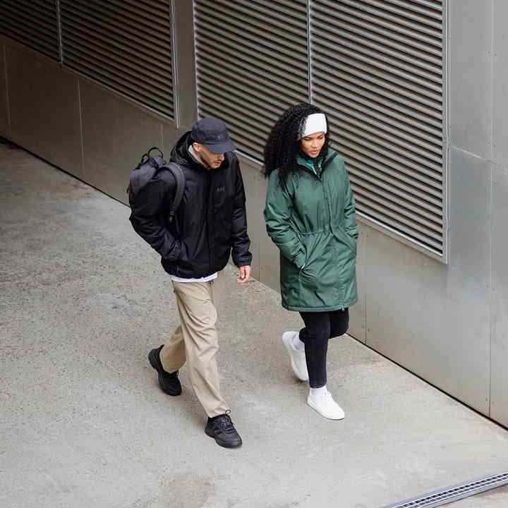 Two people wearing Helly Hansen rain jackets